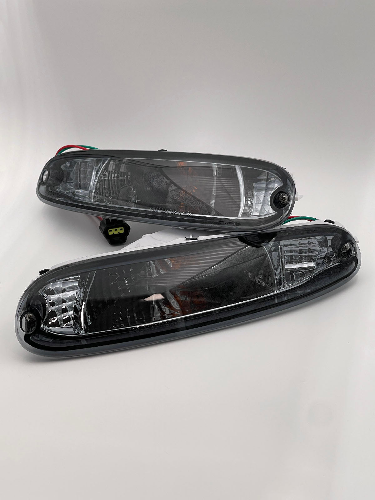 Mazda MX5 Mk1 Smoked Front Side Light Set - MX5 Parts Mazda MX5 Mk1 Smoked Front Side Light Set - MX5 Parts